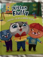 Книга "Kitten fluffy learns to be a good friend" - Анна Купырина фото