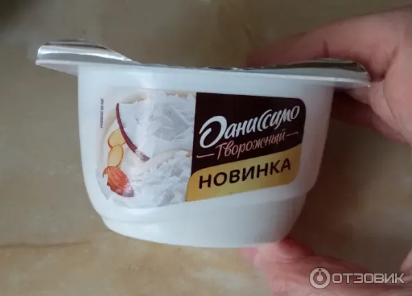 Продукт творожный Даниссимо Миндально-кокосовый десерт фото